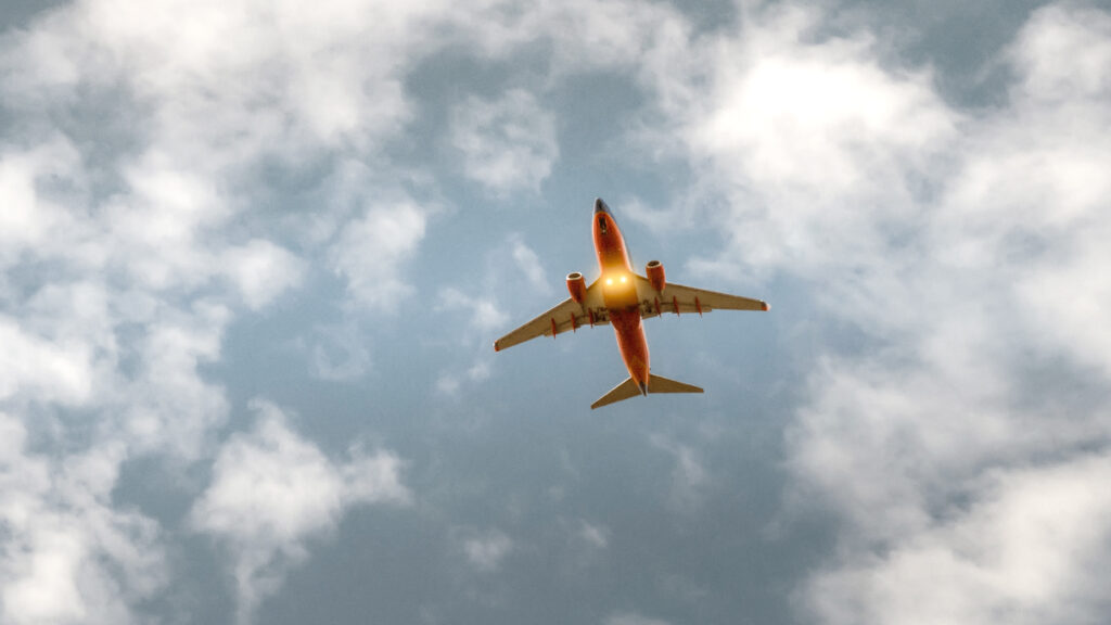 Airplane in a cloudy sky.