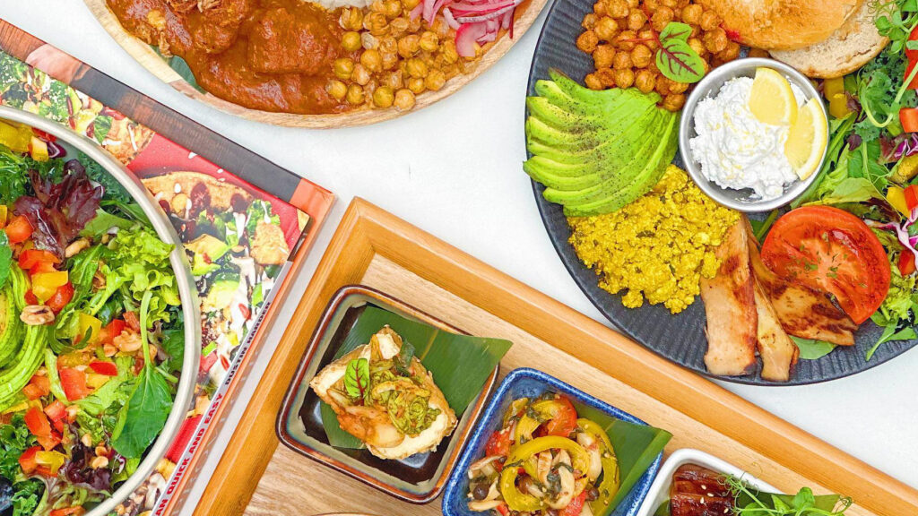 An assortment of vegan dishes photographed from above.