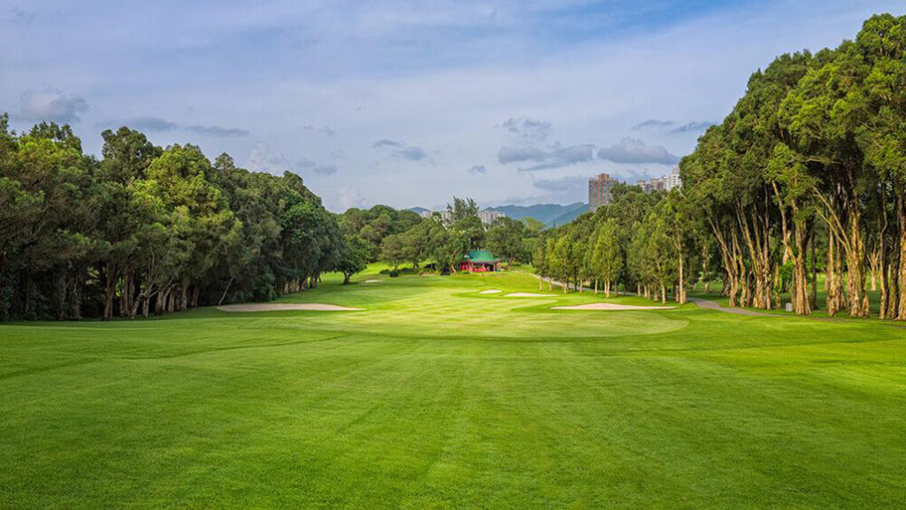 Golfing green at Hong Kong Golf Club Fanling surrounded by trees