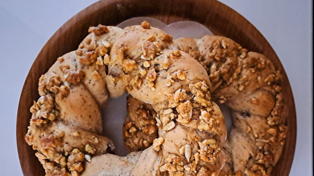 Delicious Jingle Bread from Mayse Artisan Bakery. Bagel shaped breads with crunchy granola toppings.